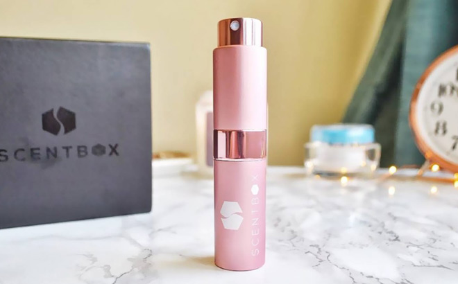 ScentBox Pink Atomizer on a Tabletop