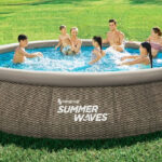Seven People Swimming in Summer Waves Inflatable Pool