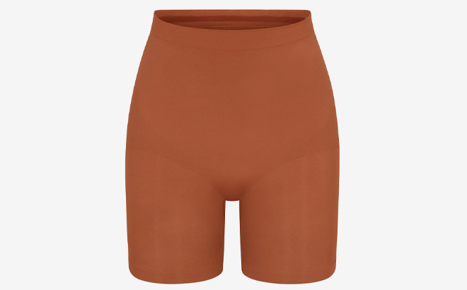 Skims Mid Thigh Shorts in bronze color