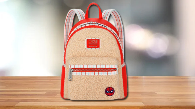 Spider Man Faux Fur Loungefly Mini Backpack on a Table Spider Man Faux Fur Loungefly Mini Backpack on a Table