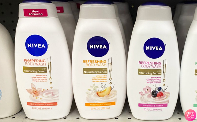 Three Bottles of Nivea Body Wash on a Shelf