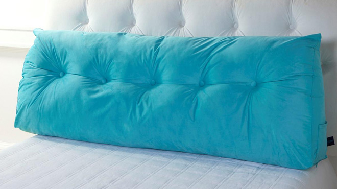 Tufted Headboard Pillow on a Bed