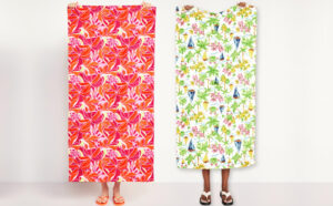 Two Men Holding Outtek Printed Beach Towels