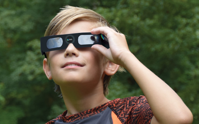 a Kid Wearing MyEyeDr Solar Eclipse Glasses