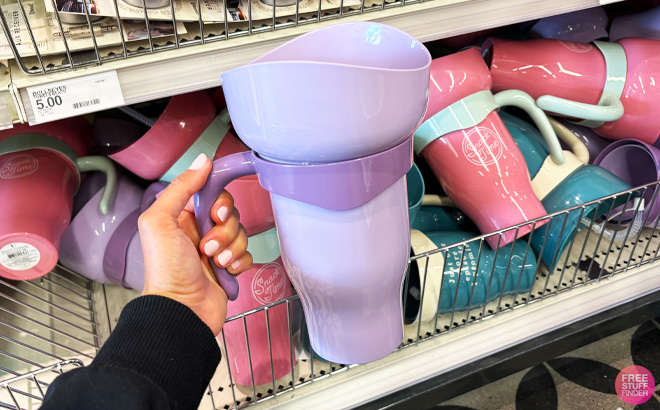 a Person Holding Purple Snack Tumbler