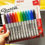 a Person Holding Sharpie Permanent Markers 12 Pack Fine Tip