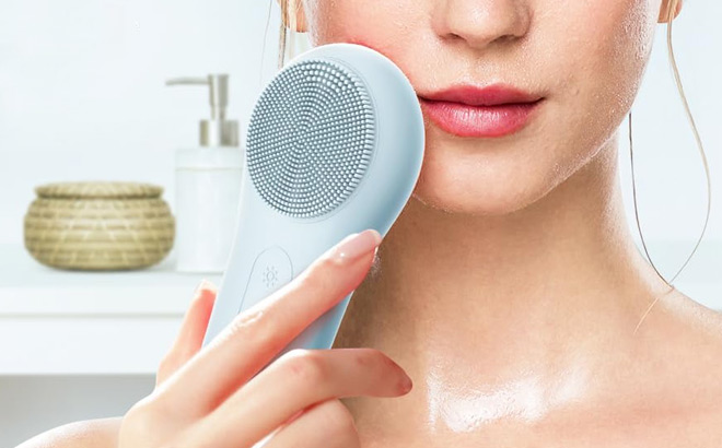 a Peson Using Facial Cleansing Brush