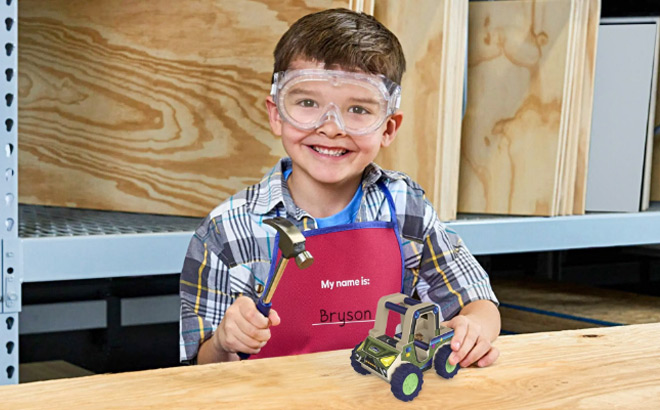 A Boy Holding Utility Terrain Vehicle