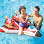 A Girl Playing on the Intex Inflatable Water Gun Plane Ride On