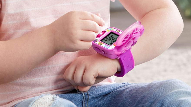 A Girl Playing with the LeapFrog Blue's Clues & You Learning Watch
