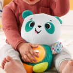 A Little Kid Holding Fisher Price Linkimals Play Together Panda