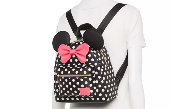 A Mannequin Wearing Disney Minnie Mouse Polka Dot Print Mini Backpack with Pink Bow
