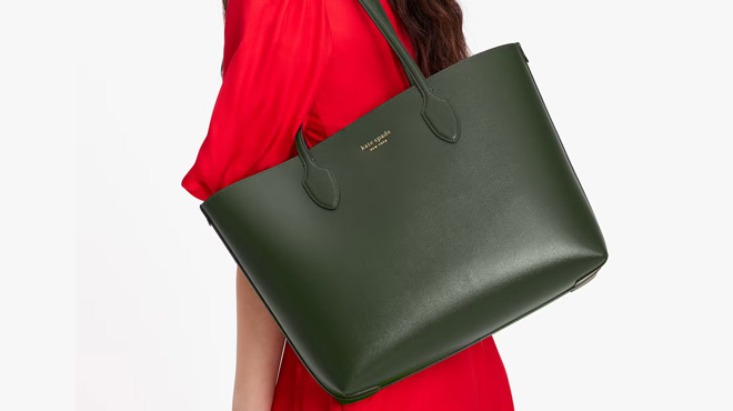 A Person Carrying a Kate Spade Bleecker Large Tote