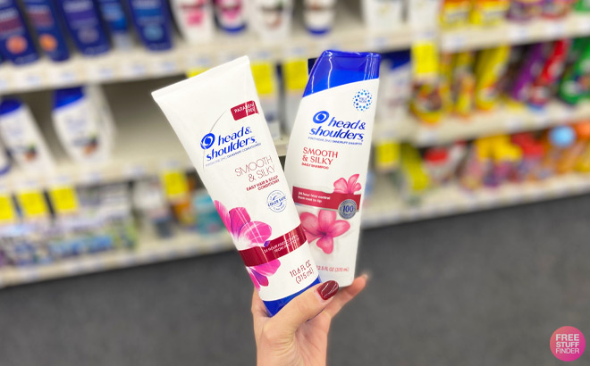 A Person Holding Head Shoulders Shampoo and Conditioner at CVS