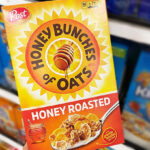 A Person Holding Honey Bunches of Oats Honey Roasted Breakfast Cereal