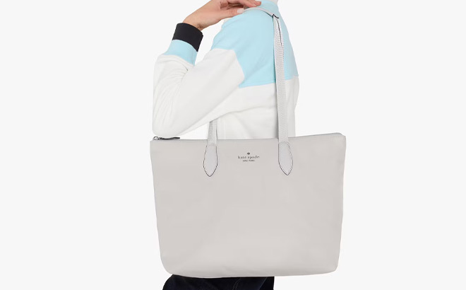 A Person Holding Kate Spade Mel Packable Tote