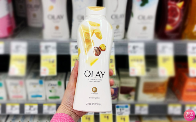 A Person Holding Olay Ultra Moisture Body Wash in Shea Butter Scent