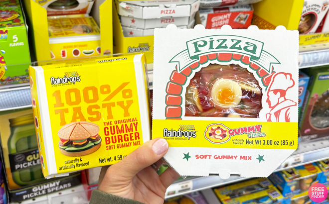 A Person Holding Raindrops Gummy Burger and Raindrops Gummy Pizza