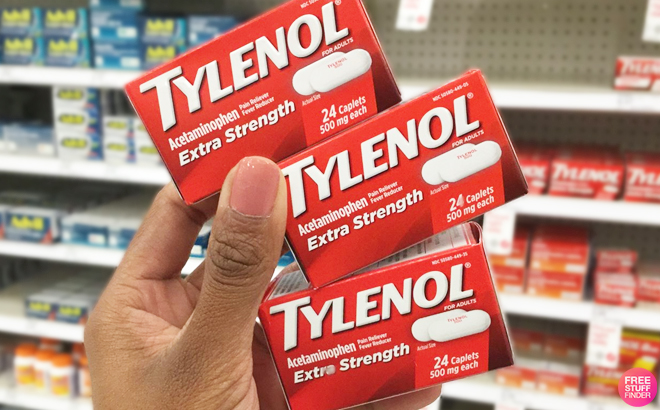 A Person Holding Three Tylenol Extra Strength 24 Count Caplets