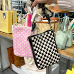A Person Holding Universal Thread Phone Crossbody Bags in Two Colors at Target