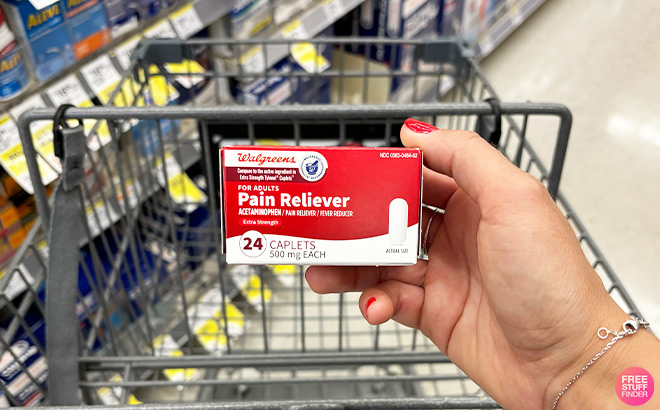 A Person Holding Walgreens Extra Strength Acetaminophen Caplets A Person Holding Walgreens Extra Strength Acetaminophen Caplets