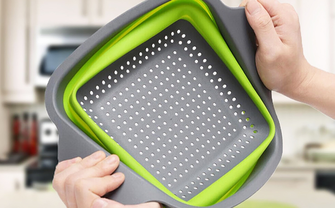 A Person Holding a Collapsible Colander