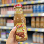 A Person Holding a Victor Allen Iced Coffee in Twix Flavor