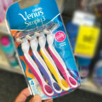 A Person Holding the Gillette Venus Simply 3 Womens 3 Blade Disposable Razor at CVS