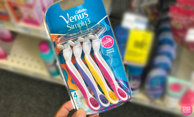 A Person Holding the Gillette Venus Simply 3 Womens 3 Blade Disposable Razor at CVS