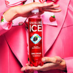 A Person Holding the Sparkling Ice Black Raspberry Sparkling Water