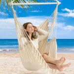 A Person Sitting in Y Stop Hammock Chair Hanging Rope Swing