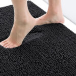 A Person Steeping on a Smiry Luxury Chenille Bath Rug