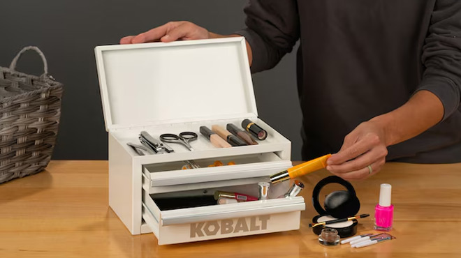 A Person Tidying up Makeup Accessories using the Kobalt Mini 2 Drawer Steel Tool Box