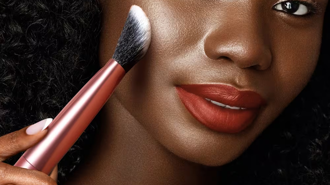 A Person Using Real Techniques Seamless Complexion Makeup Brush A Person Using Real Techniques Seamless Complexion Makeup Brush