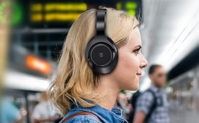 A Person Using Willmood Wireless Bluetooth Headphones
