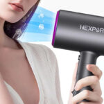 A Person Using a Nexpure Professional Ionic Hairdryer