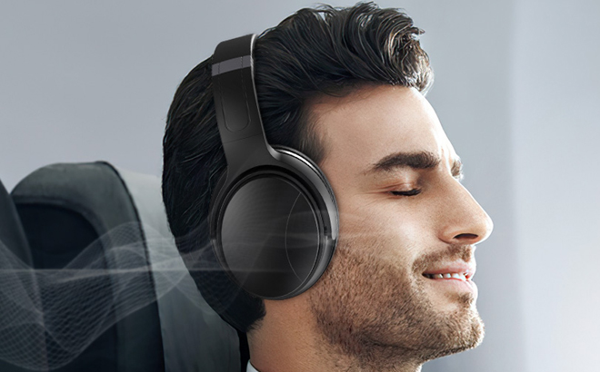 A Person Using Noise Cancelling Headphones