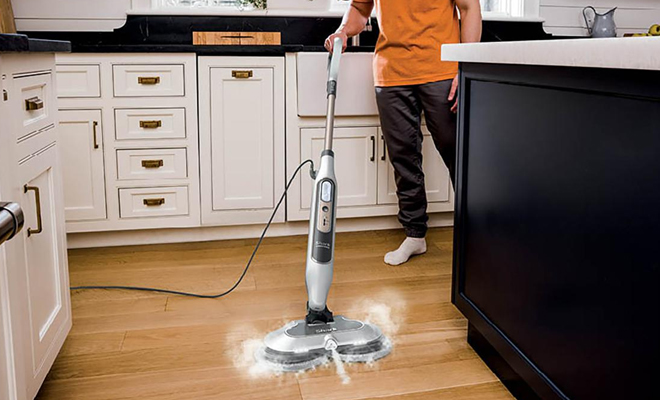 A Person Using the Shark Steam Scrub Steam Mop with Steam Blaster