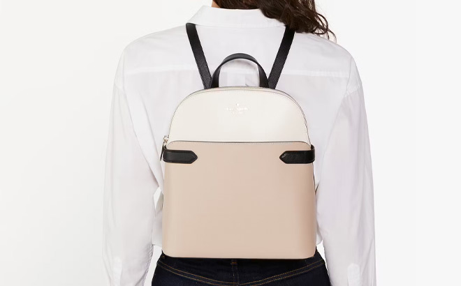 A Person Wearing Kate Spade Staci Colorblock Dome Backpack