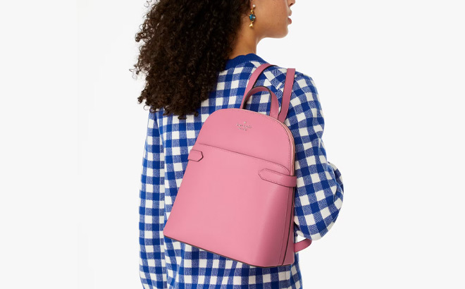 A Person Wearing Kate Spade Staci Dome Backpack A Person Wearing Kate Spade Staci Dome Backpack