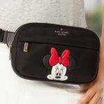 A Person Wearing a Disney X Kate Spade New York Minnie Belt Bag