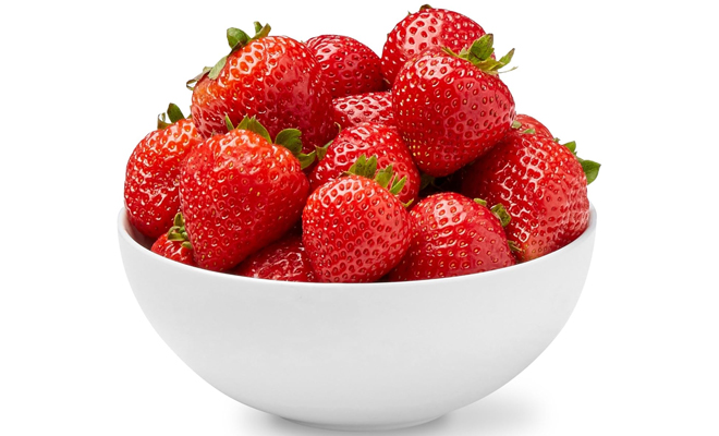 A White Bowl Filled with Strawberries