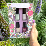 A Woman Holding Londontown 4 Piece Spring Fling Nail Lakur Collection