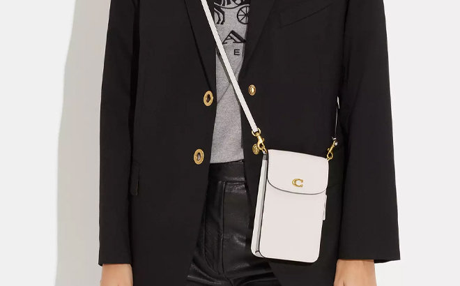 A Woman Wearing Coach Outlet Phone Crossbody Bag A Woman Wearing Coach Outlet Phone Crossbody Bag