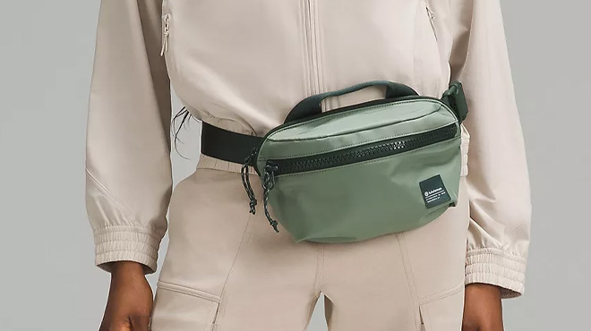 A Woman Wearing Lululemon All Day Essentials Belt Bag