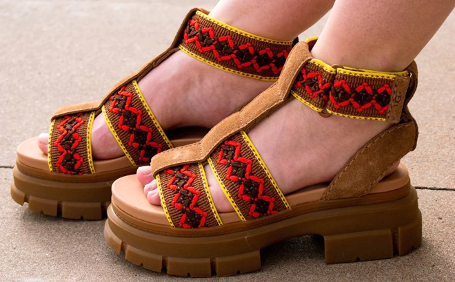 A Woman Wearing UGG Ashton Heritage Braid Sandals