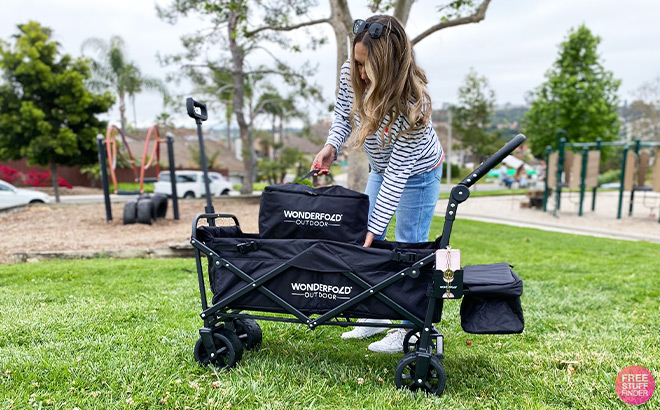 A Woman with a Folding Outdoor Wagon A Woman with a Folding Outdoor Wagon