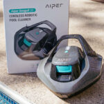 Aiper Cordless Robotic Pool Cleaner Next to a Pool