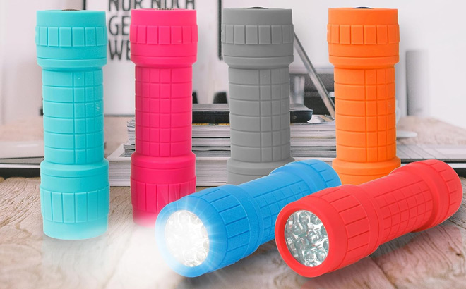 EverBrite 9 LED Flashlight 6 Pack Compact Handheld Torch on the Table