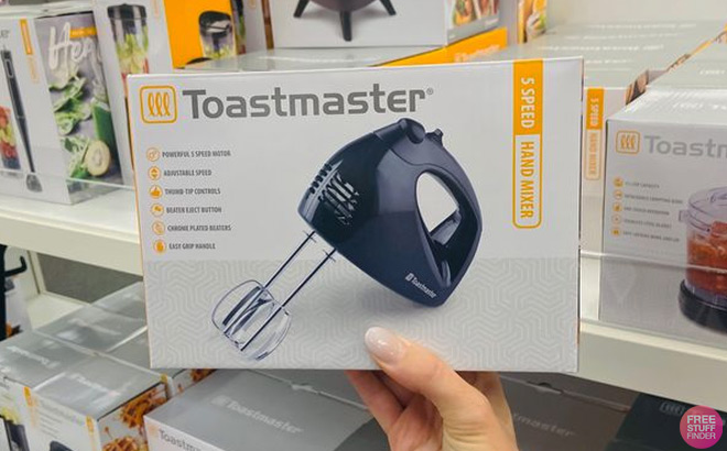 Hand Holding Toastmaster Hand Mixer Hand Holding Toastmaster Hand Mixer